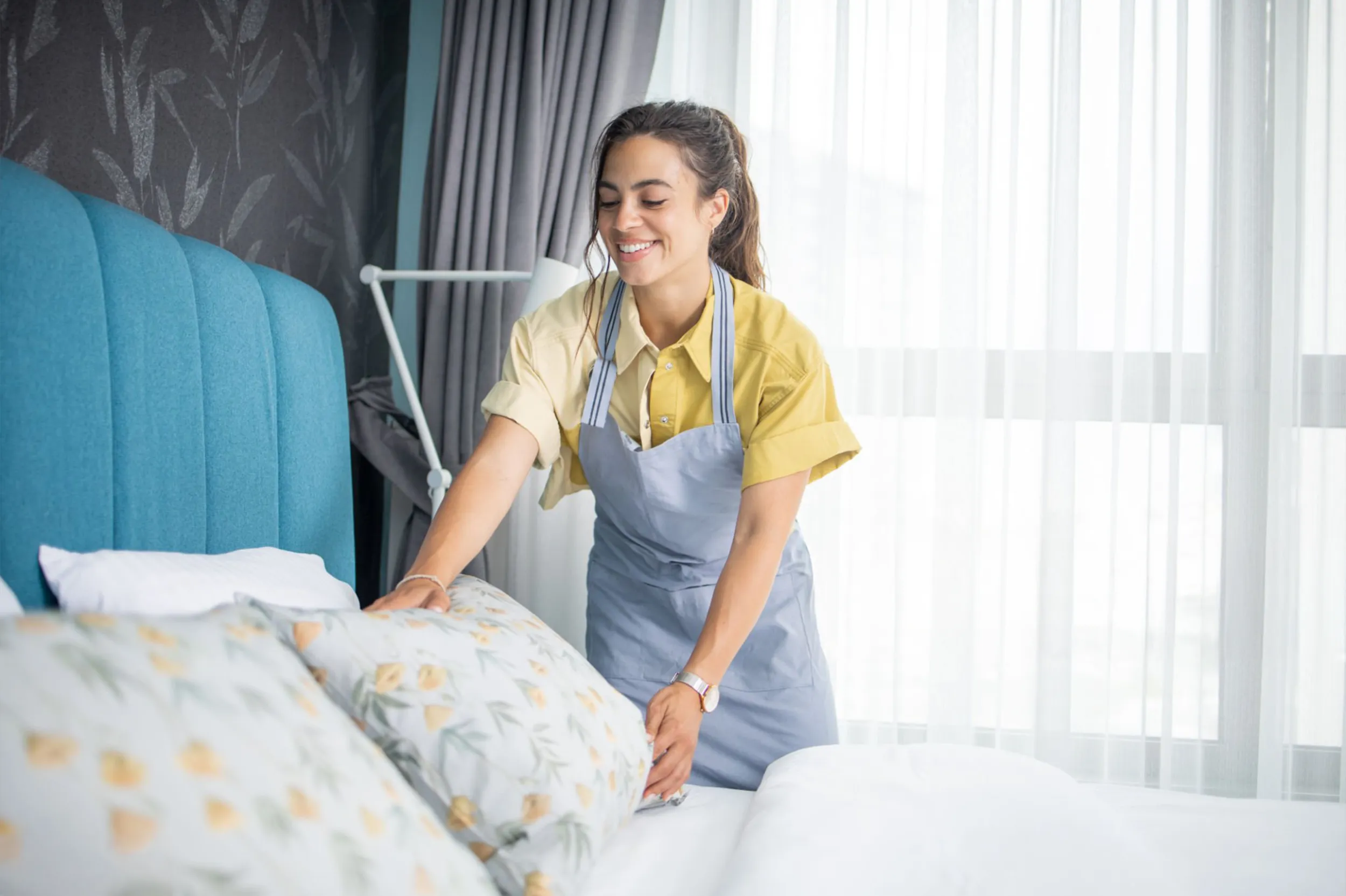 women cleaning bed